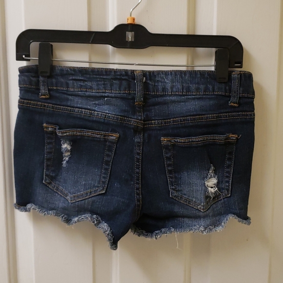 Distressed denim shorts - Picture 2 of 3